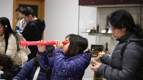 A young family in the Learning Gallery.