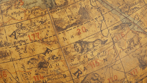 Animals and buildings of North Africa depicted on the surface of the globe