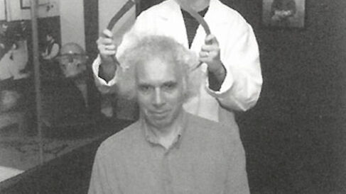 Jim being measured in 1900: The New Age