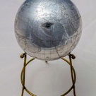 Silver-coloured metal globe