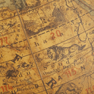 Animals and buildings of North Africa depicted on the surface of the globe
