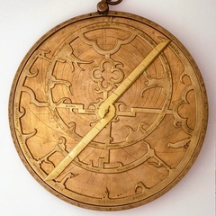 Detail from a 14th-century English astrolabe, including a bird