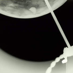 x-ray image of the English Globe showing the metal stand and a loose bag of lead shot.