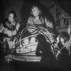 Engraved print of "a philosopher giving a lecture around the orrery"