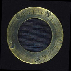 Micrometer with a fine silver-wire lattice