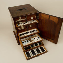 Wooden cabinet containing several hundred foraminifera slides.