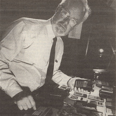 Francis Hookham portrait with calculator collection, 1988