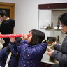 A young family in the Learning Gallery.