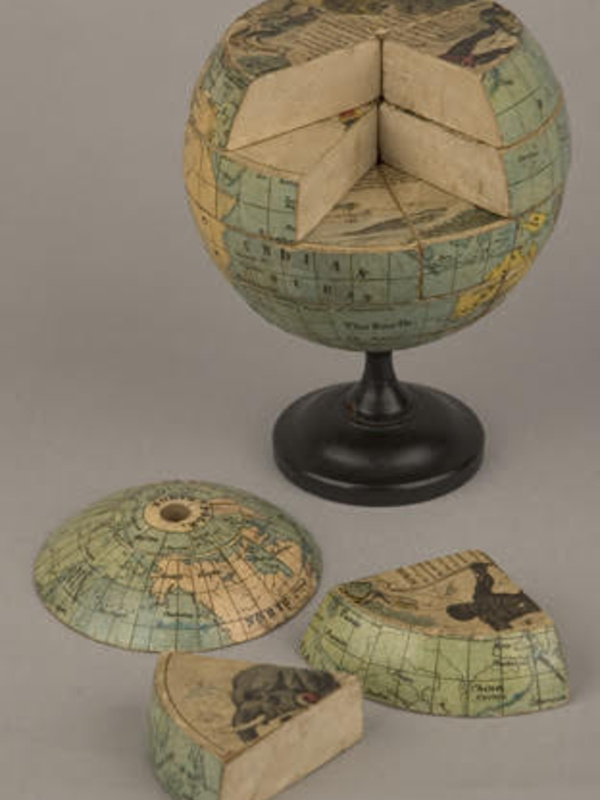 Jigsaw puzzle globe with segments removed