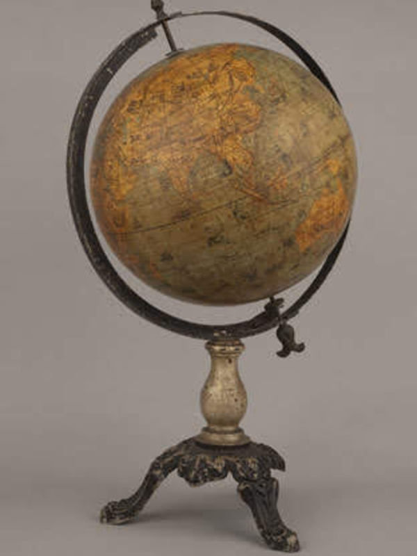 Table globe showing native flora and fauna in different geographical regions