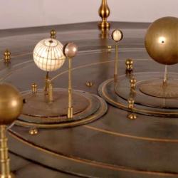 Detail from the grand orrery showing several planets and their satellites