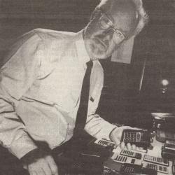 Francis Hookham portrait with calculator collection, 1988
