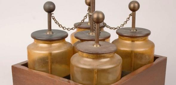 A battery of five Leyden jars, used to store static electricity so that its effects could be harnessed and studied.