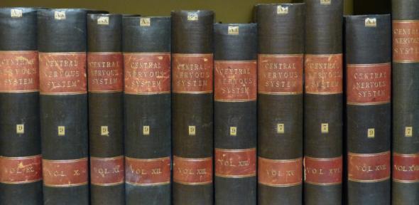 One shelf of the collection of bound Foster Pamphlets.