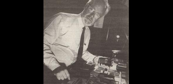 Francis Hookham portrait with calculator collection, 1988 Francis Hookham portrait with calculator collection, 1988