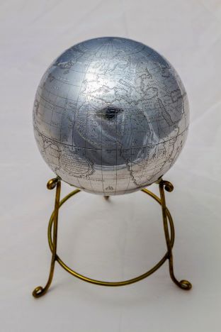 Silver-coloured metal globe