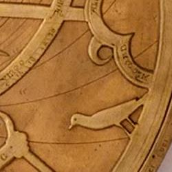 Detail from a 14th-century English astrolabe, including a bird