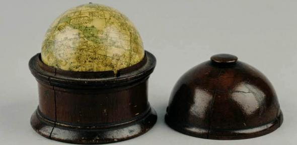 Pocket globe by London globemaker Newton, in a wooden case.