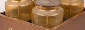 A battery of five Leyden jars, used to store static electricity so that its effects could be harnessed and studied.